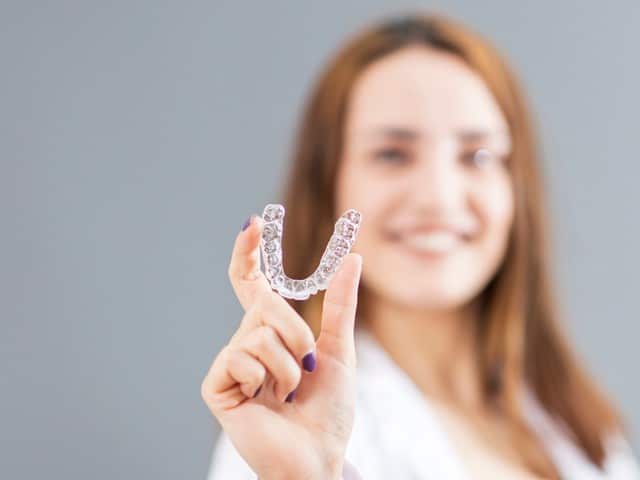 SureSmile® clear aligner therapy allows straight teeth without metal braces 645bbb2871dc5.jpeg